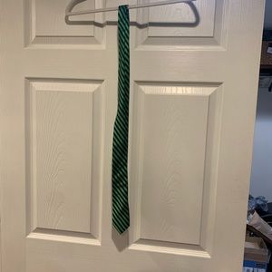 Green and black patterned tie